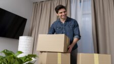 man handling belongings after moving new home